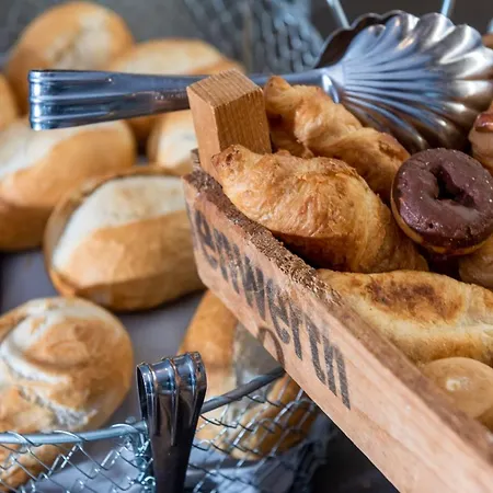 호텔 윈드햄 가든 시티 센터 쾨닉스알레 4*